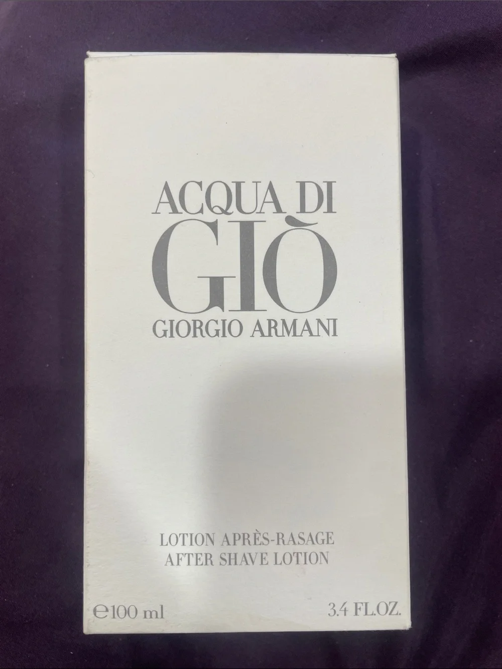 Giorgio Armani Acqua di Giò After Shave Lotion — White and Silver Text